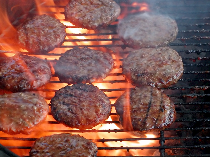 Burgers On A Barbecue