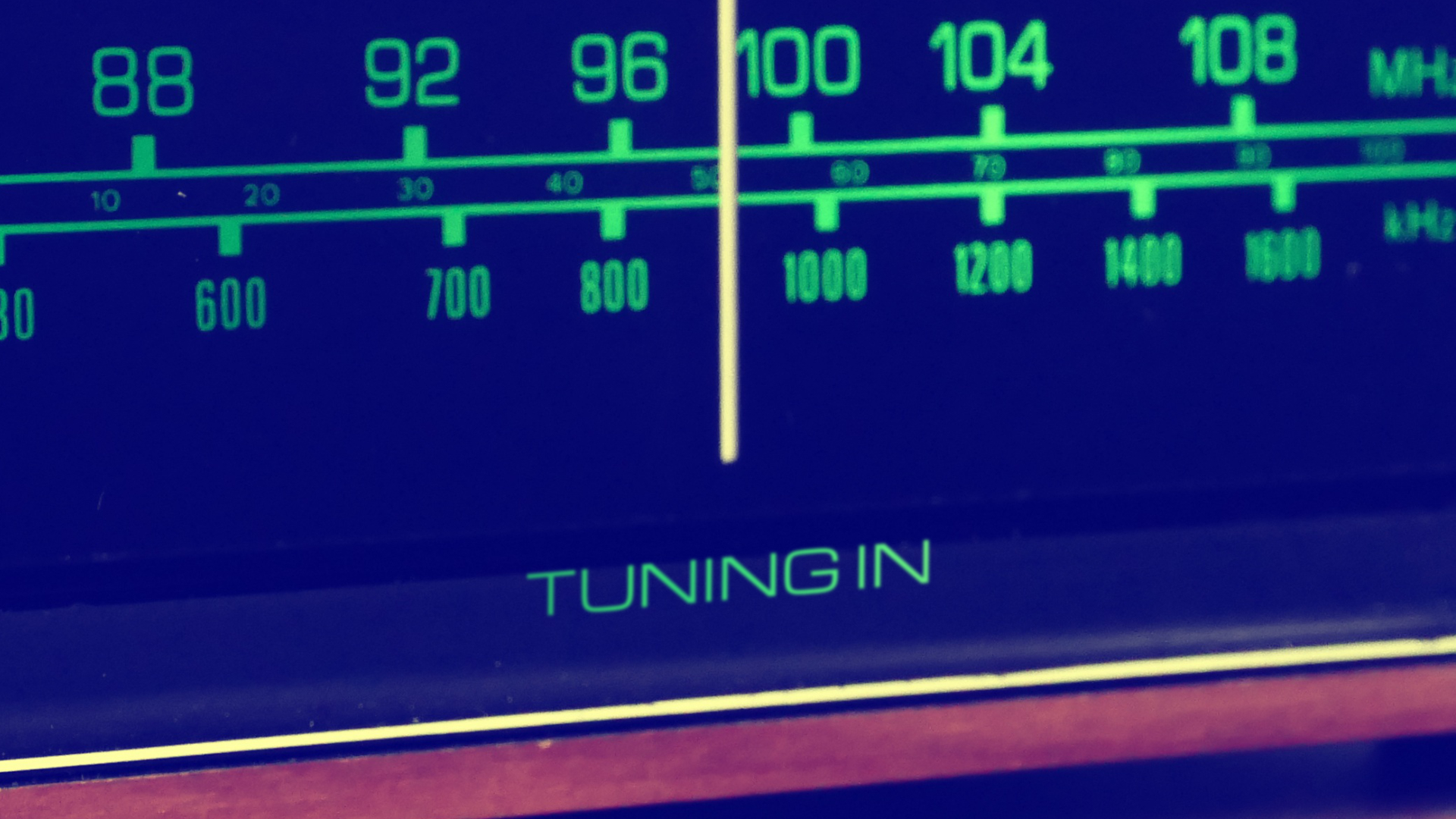 Radio tuner with 'Tuning In' title